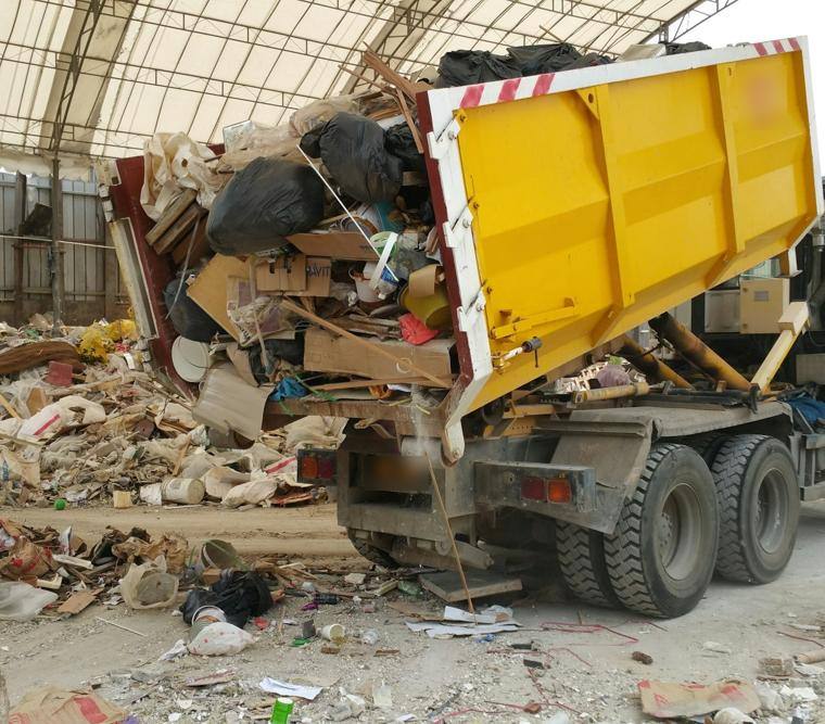 Tipper unloading at a waste transfer site